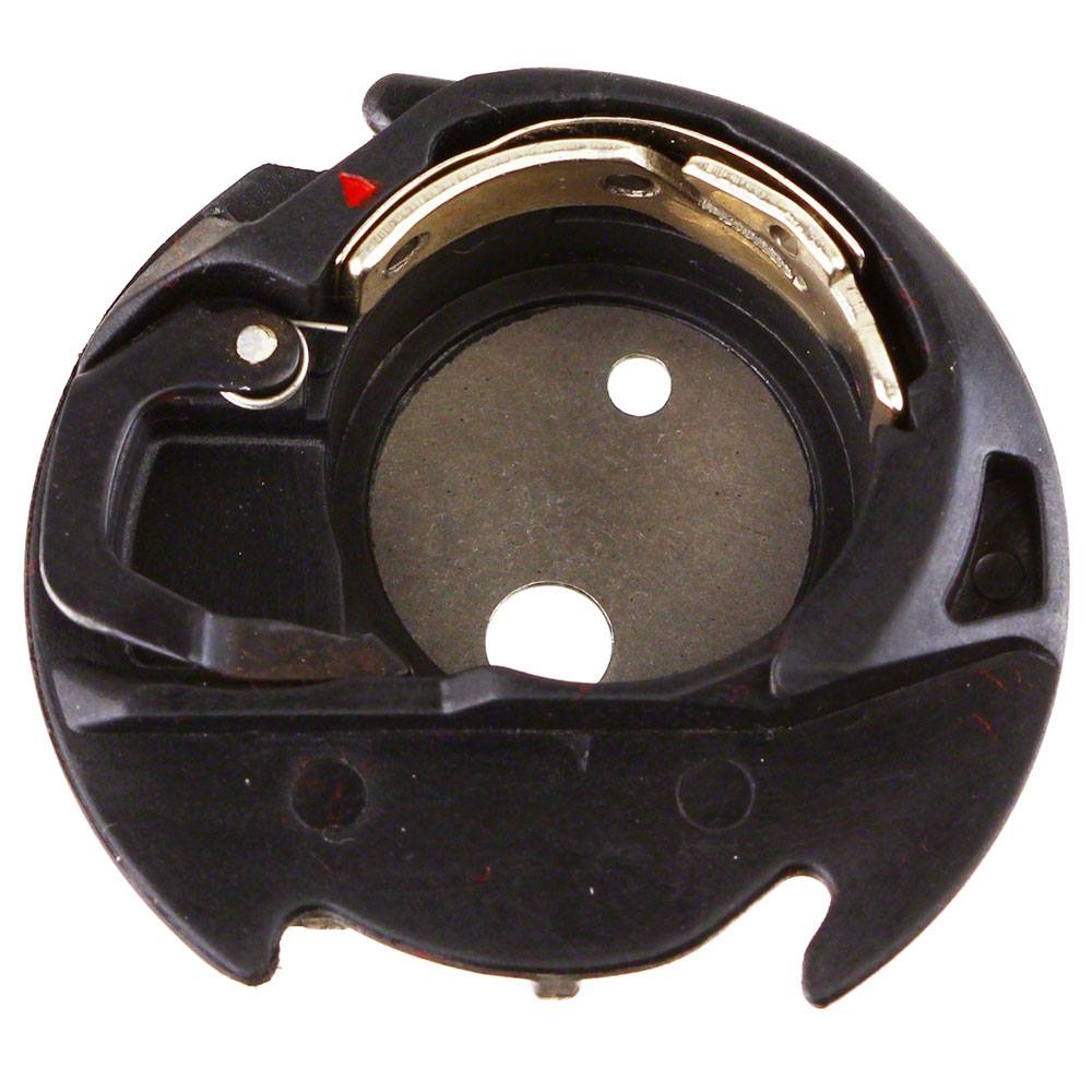 Black bobbin case for Janome sewing machines with visible metal parts and a red marking on one side. Black bobbin case for Janome sewing machines with visible metal parts and a red marking on one side.