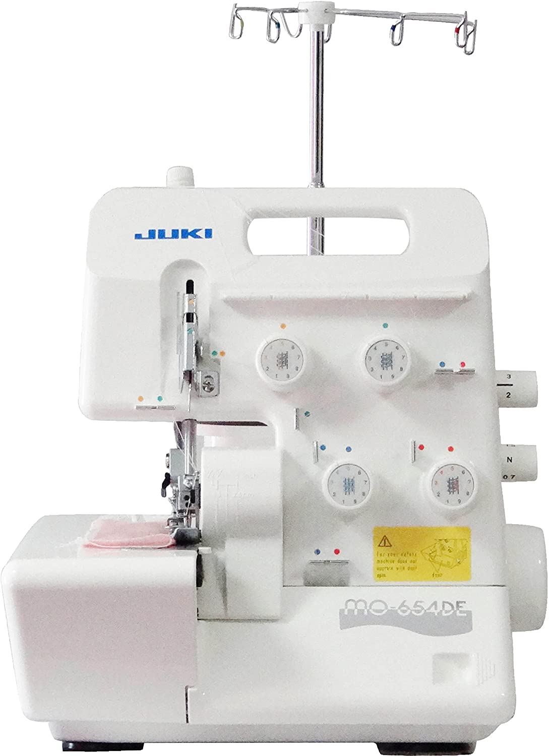 Juki MO-654DE Overlock Serger Machine, a white sewing machine with dials and controls on the top and front panels. Juki MO-654DE Overlock Serger Machine, a white sewing machine with dials and controls on the top and front panels.