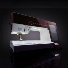 Sewing machine with a dark background Sewing machine with a dark background