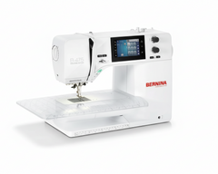 White Bernina sewing machine on a white background