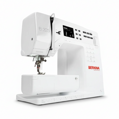 White Bernina sewing machine on a white background