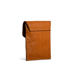 Brown leather pouch on a white background