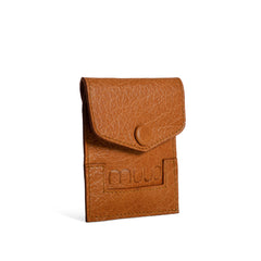 Brown leather cardholder with 'Croll' branding on a white background