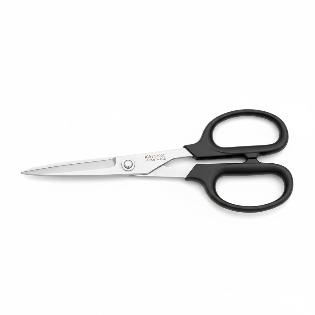 Pair of scissors with black handles on a white background