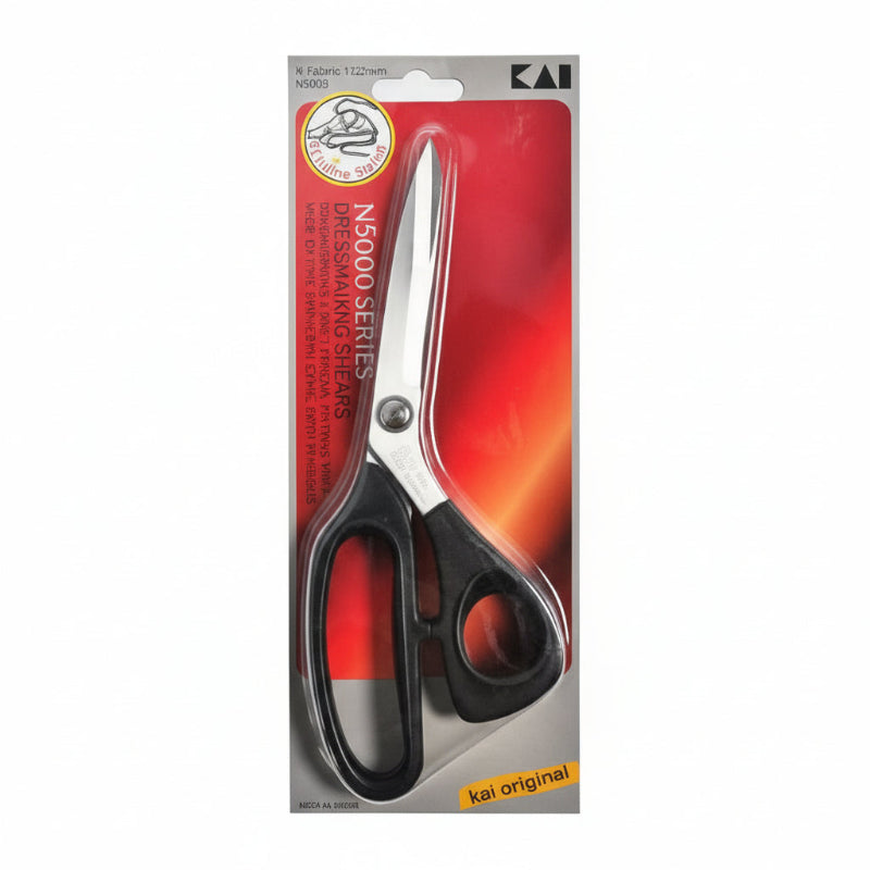 Pair of scissors in packaging with a visible brand logo on a white background