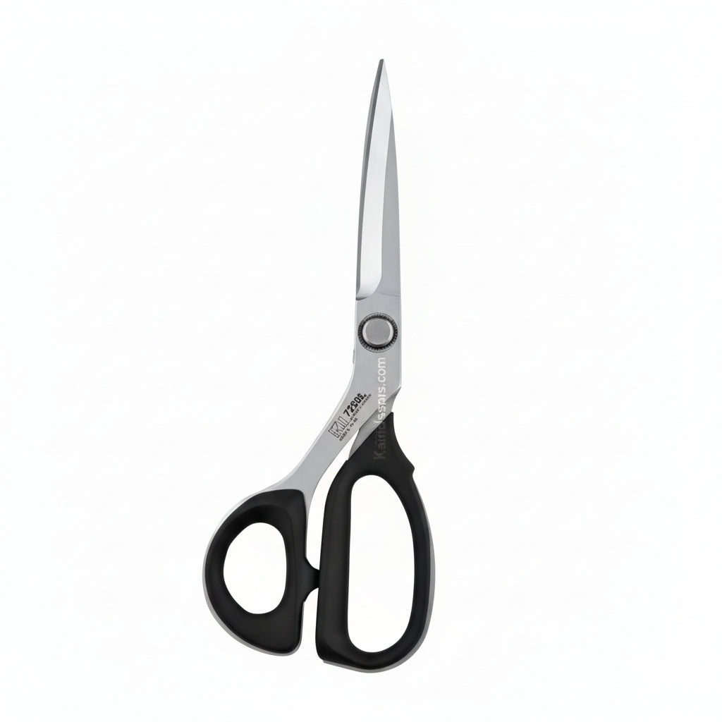 Pair of scissors with a metallic handle on a white background