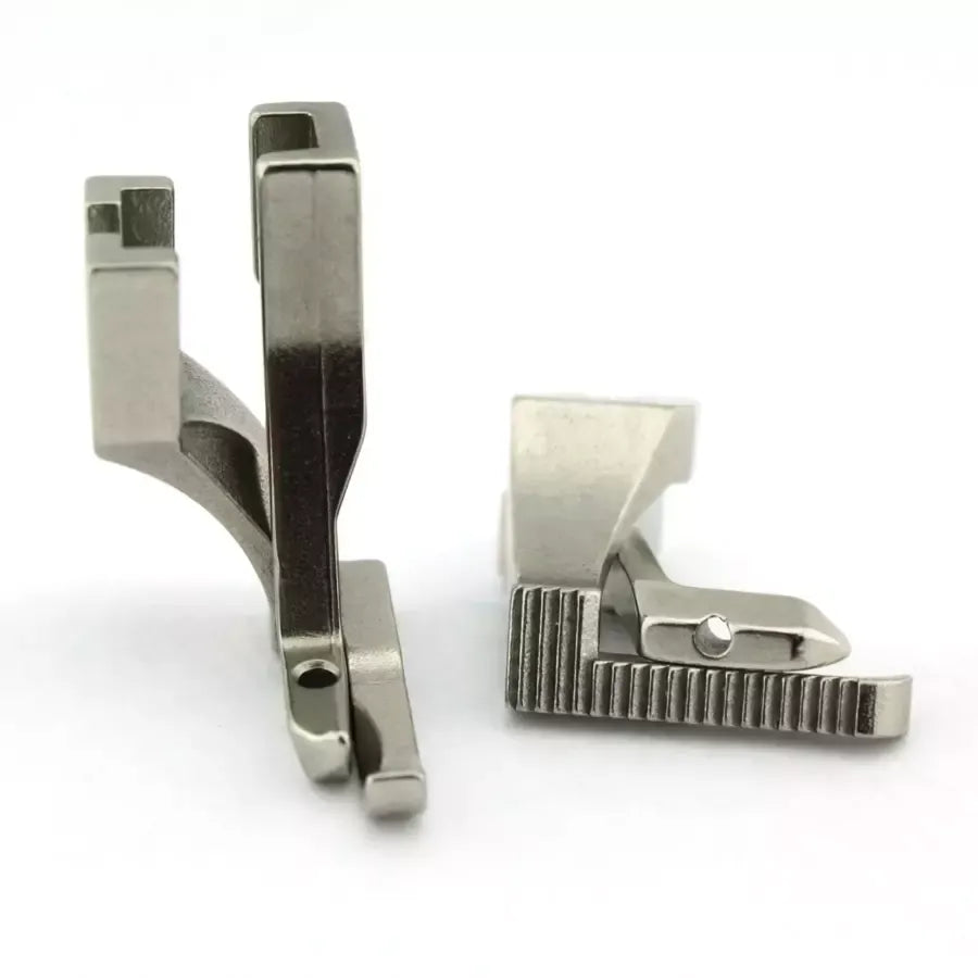 Metal sewing machine presser foot on a white background