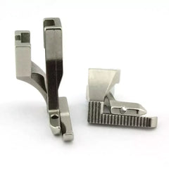 Metal sewing machine presser foot on a white background