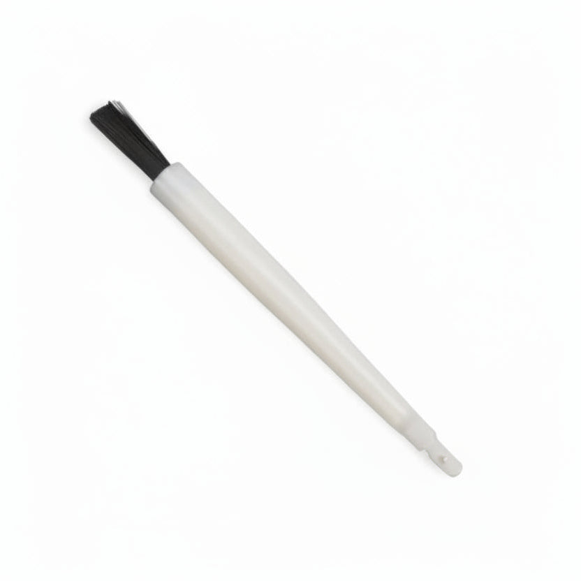 White brush with black bristle head on a white background