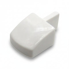 White plastic wedge-shaped object on a white background