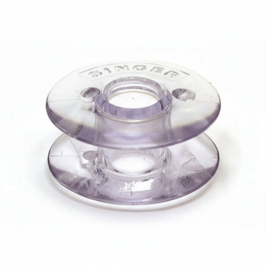 Clear plastic bobbin with 'Singer' branding on a white background