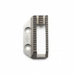 Metallic tool blade with engraved design on a gray background