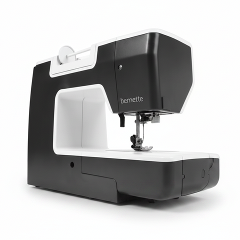 A BERNETTE compact sewing machine in black and white, shown from a three-quarter angle on a solid white background.