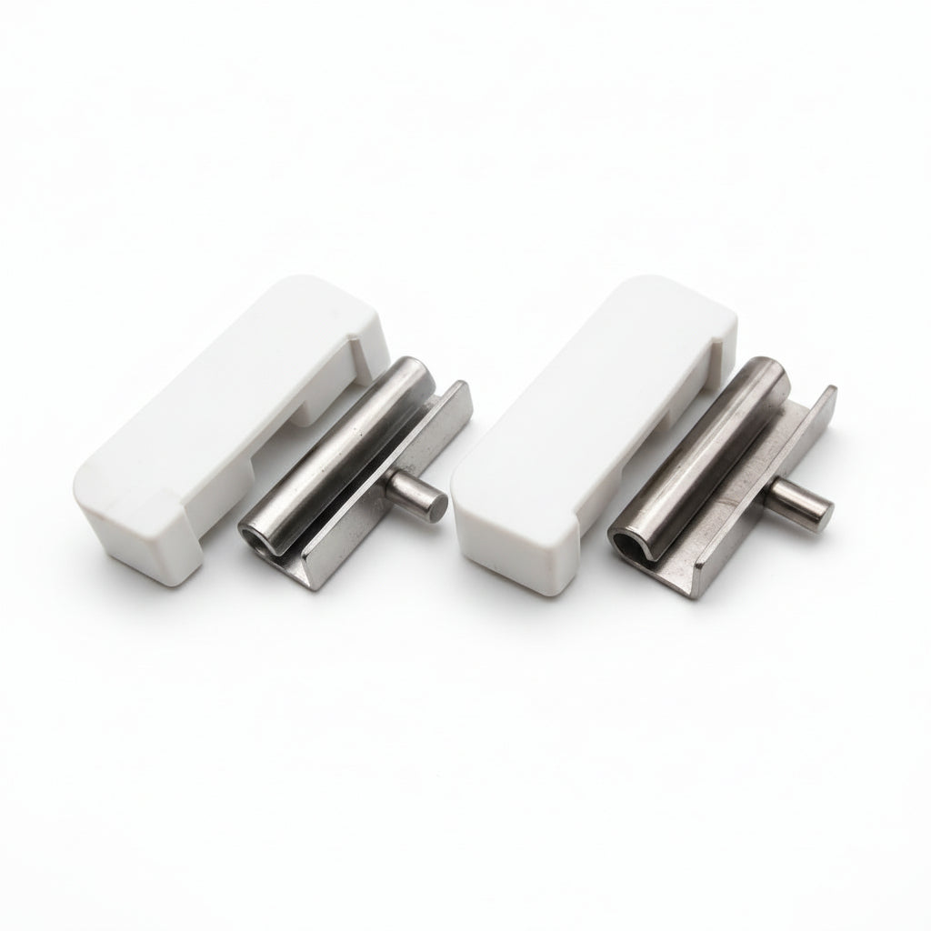 Two metallic door handles on a white background