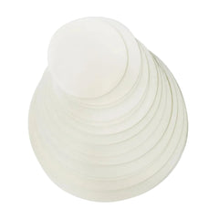 White spherical object with concentric circular patterns on a white background
