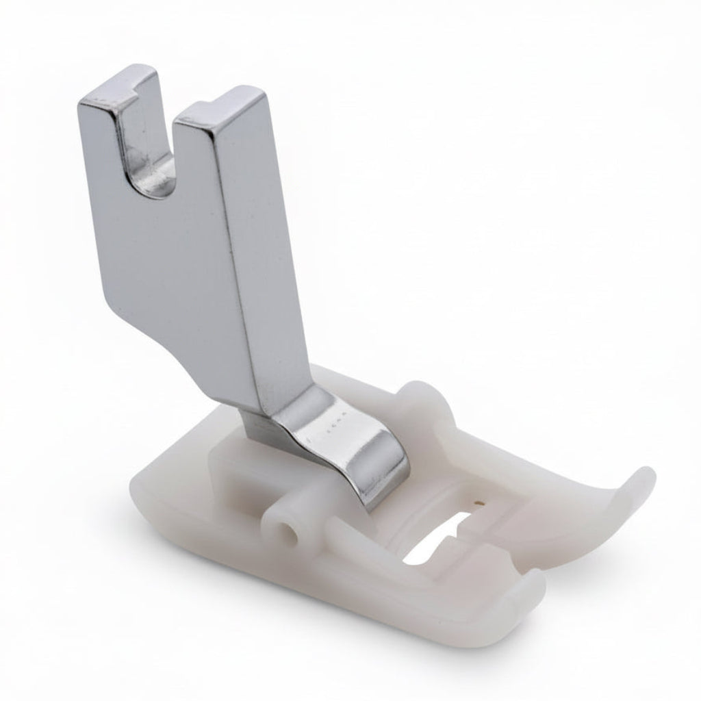 Metallic sewing machine presser foot on a white background
