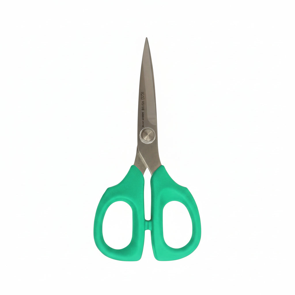 Pair of green-handled scissors on a white background