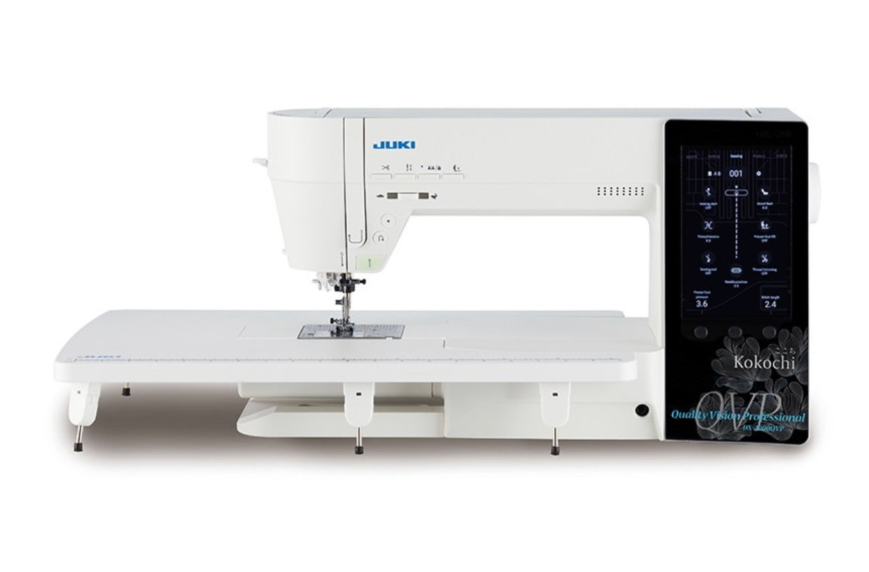 Juki sewing machine with digital display on a white background