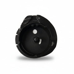 Black plastic component on a white background